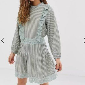 Mini skater dress with broderie trims